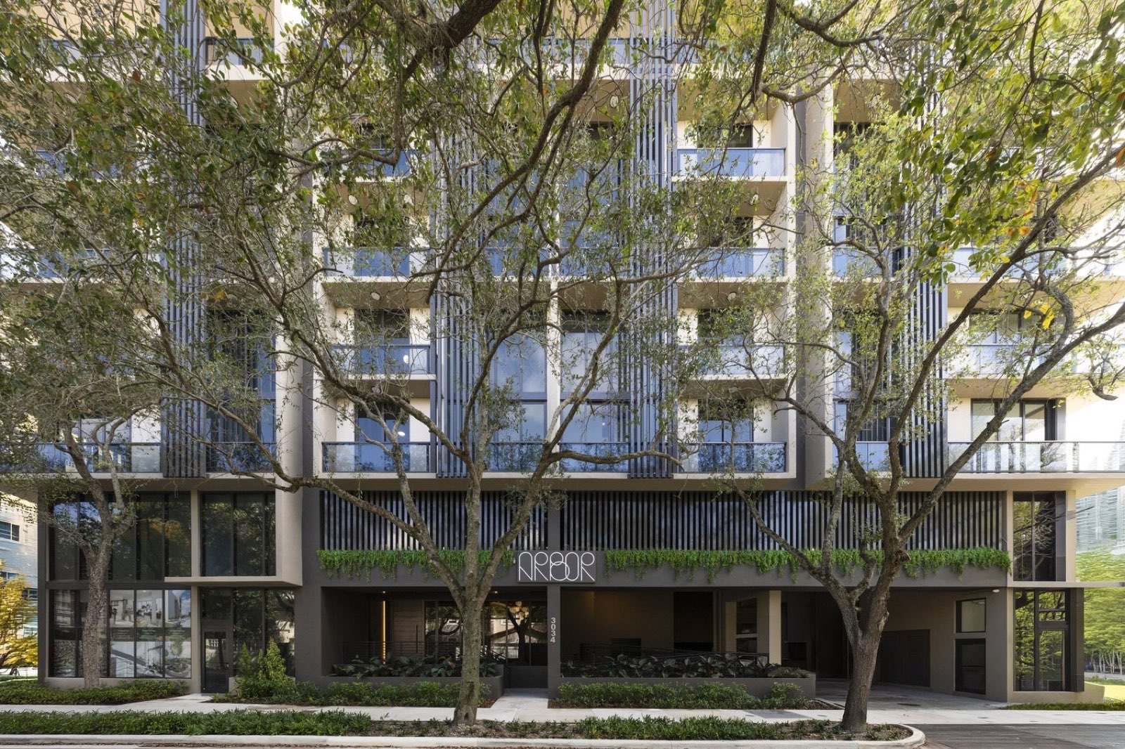 Arbor Residences Coconut Grove exterior in daylight, five-story facade at 3034 Oak Avenue