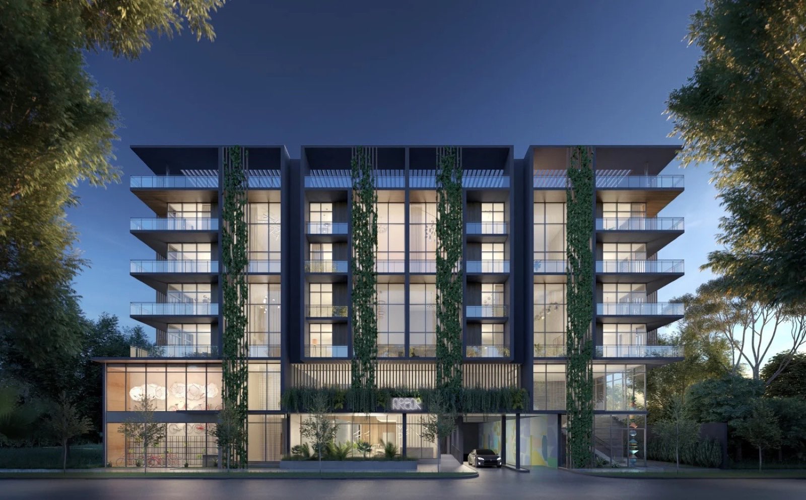 Arbor Residences Coconut Grove building exterior at dusk, five-story boutique condominium at 3034 Oak Avenue
