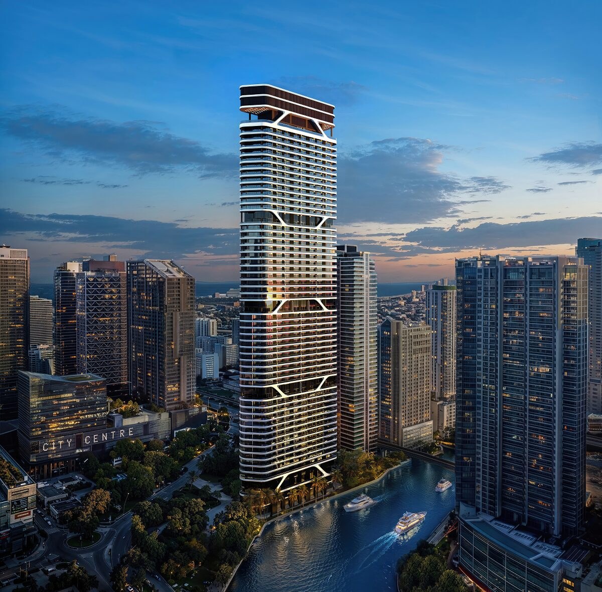 Bugatti Residences Miami official rendering, 60-story branded tower at 75 SW Miami Avenue Road on the Miami River in Brickell at dusk