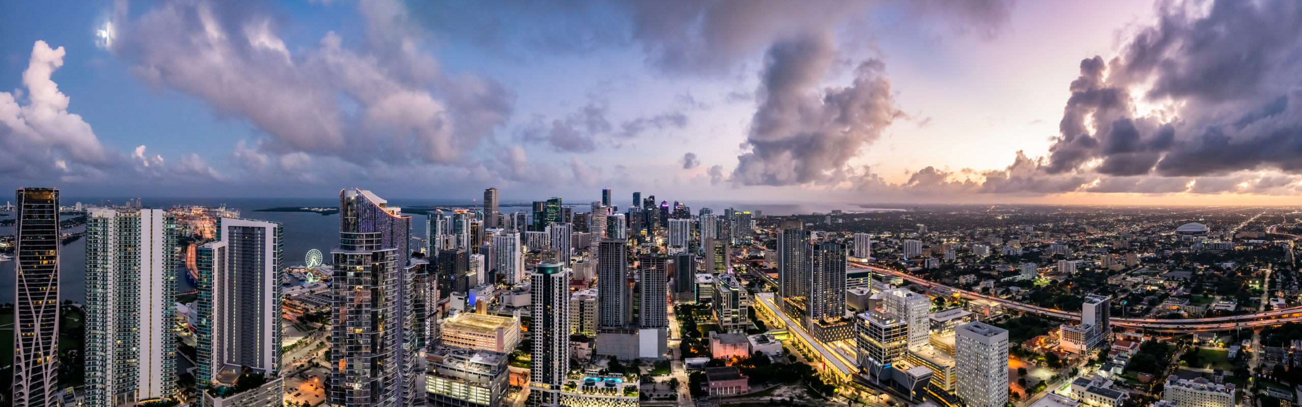 Panoramic Miami skyline and Biscayne Bay view from an upper-floor residence at E11even Residences Miami