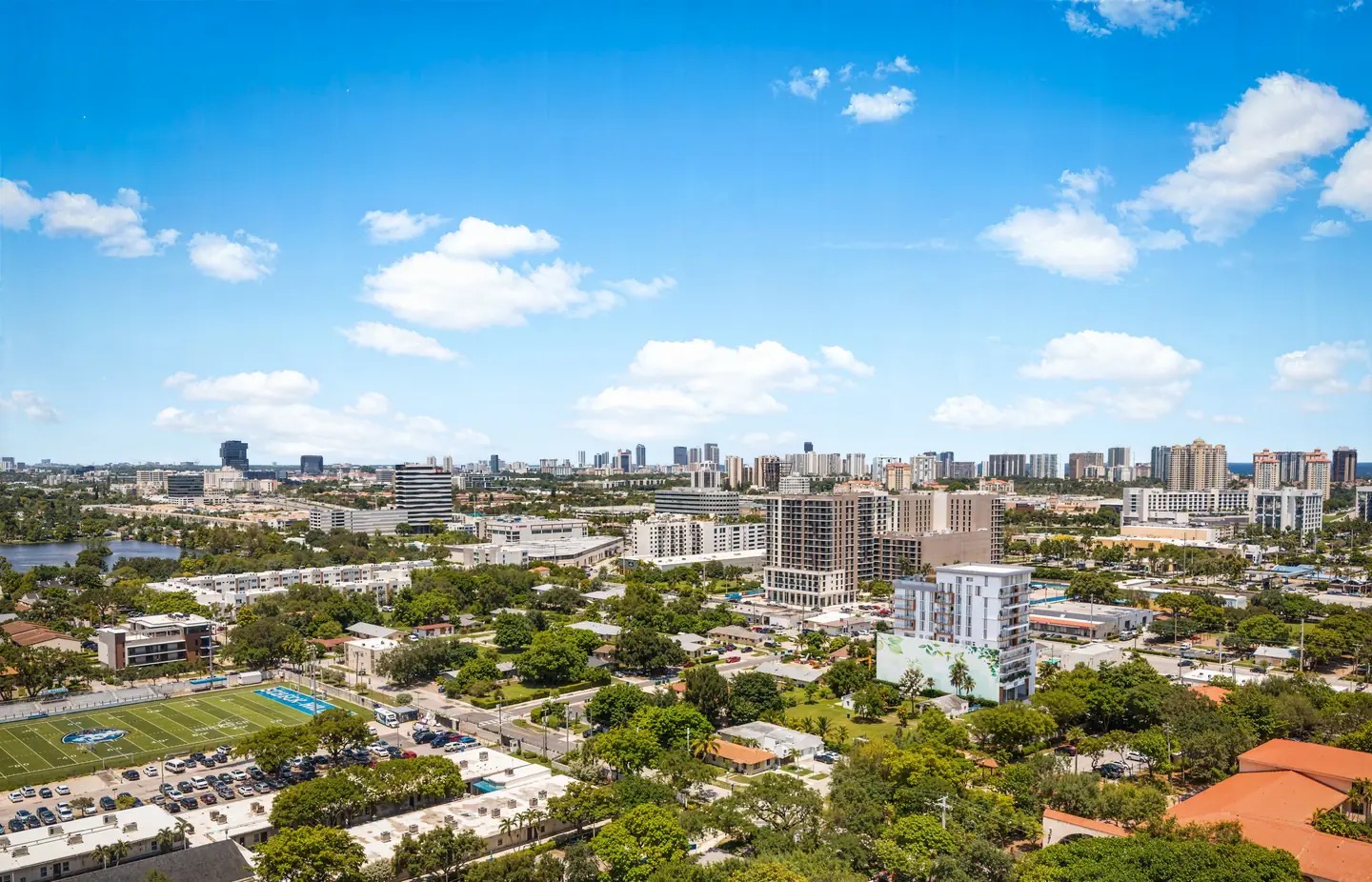 Aerial rendering of Eden Residences in Ojus looking northeast toward Sunny Isles Beach and the Atlantic