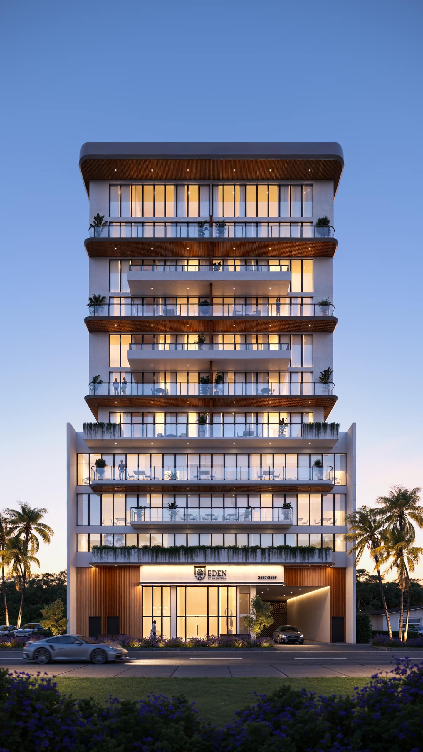 Eden Residences official rendering at dusk, a 10-story boutique condominium at 2557 NE 190th Street in Ojus, Miami-Dade
