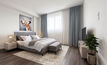 Havana Enclave bedroom with luxury vinyl plank flooring and walk-in closet