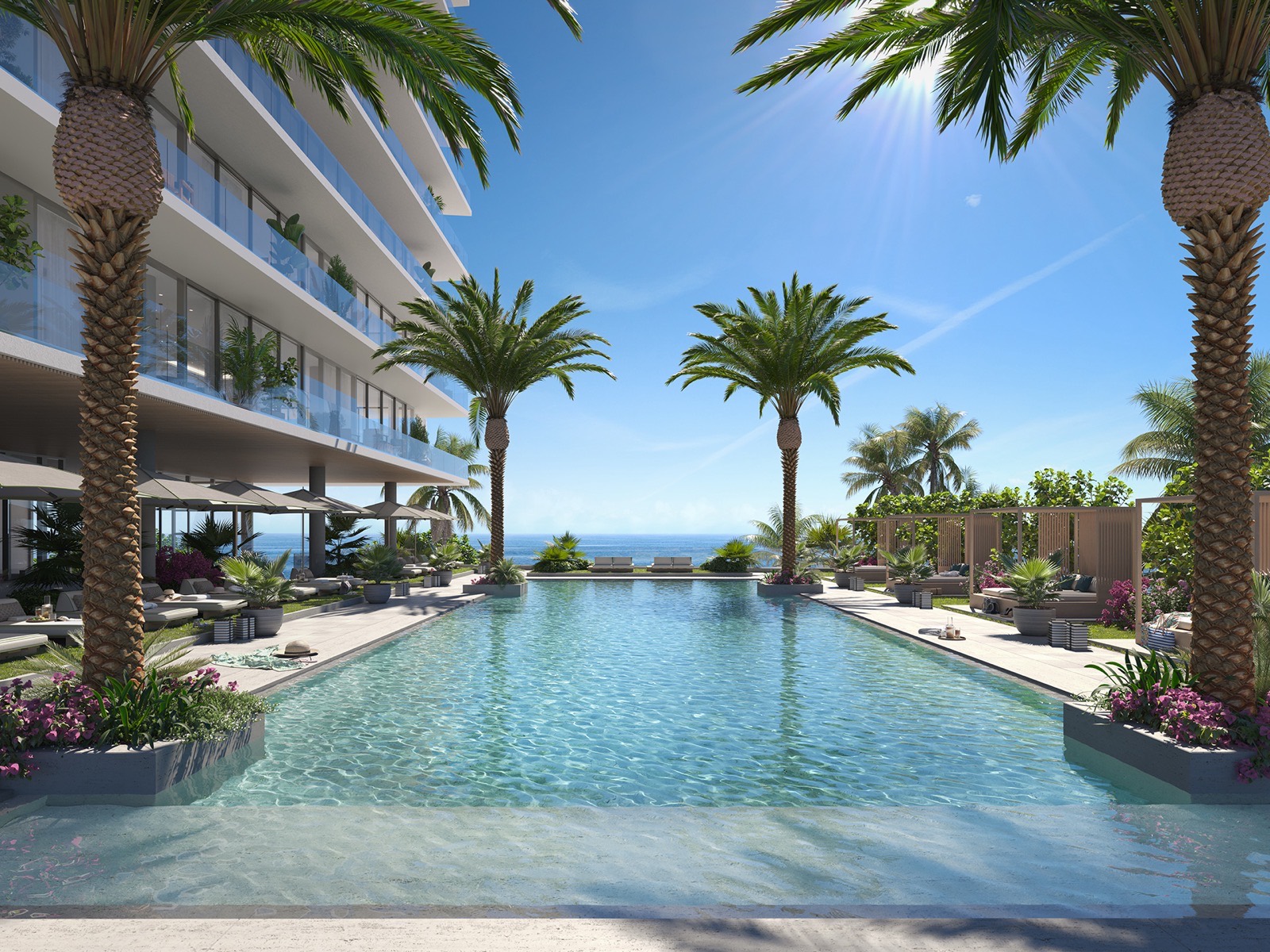Oceanfront swimming pool rendering at Rosewood Residences Hillsboro Beach with cabanas and sunbeds facing the Atlantic