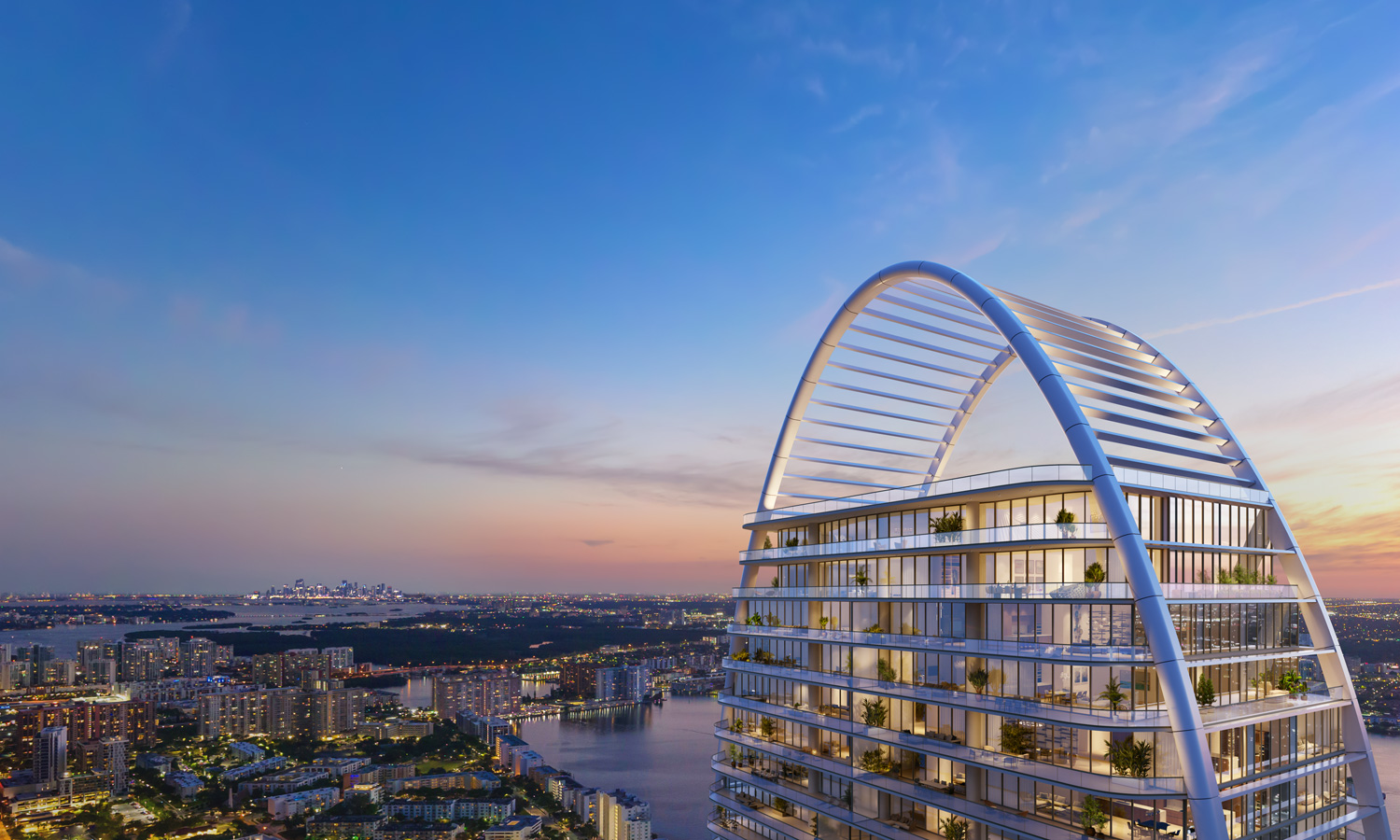 The St. Regis Residences Sunny Isles Beach official rendering, two 62-story elliptical oceanfront towers at 18801 Collins Avenue at dusk