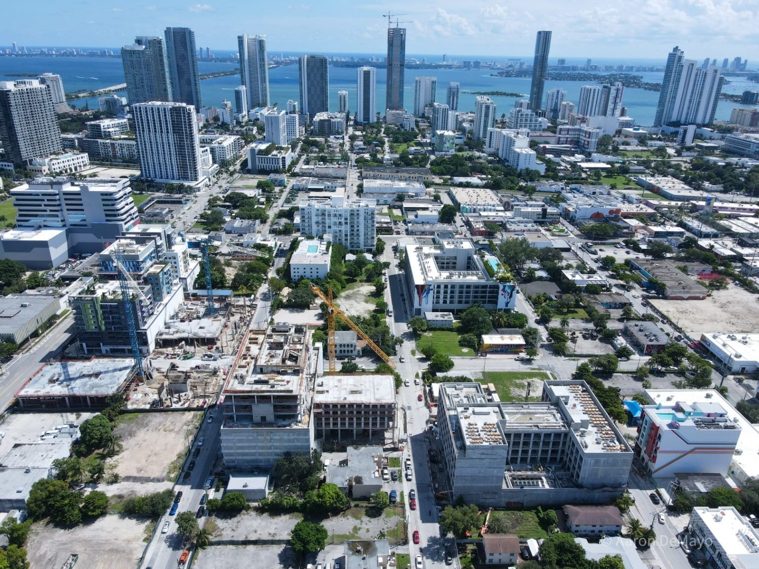 Aerial view of Miami's Wynwood and Design District area showing urban development, skyline proximity, and luxury condo growth