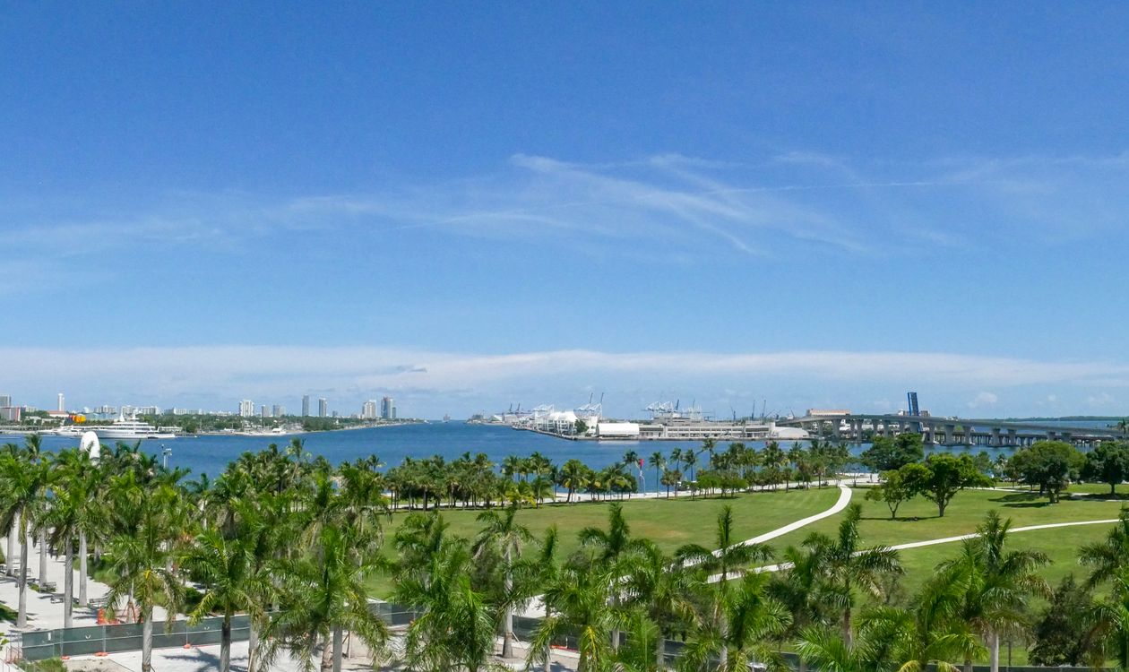 Miami bayfront skyline from Museum Park, backdrop for the city's growing roster of branded residences in 2026