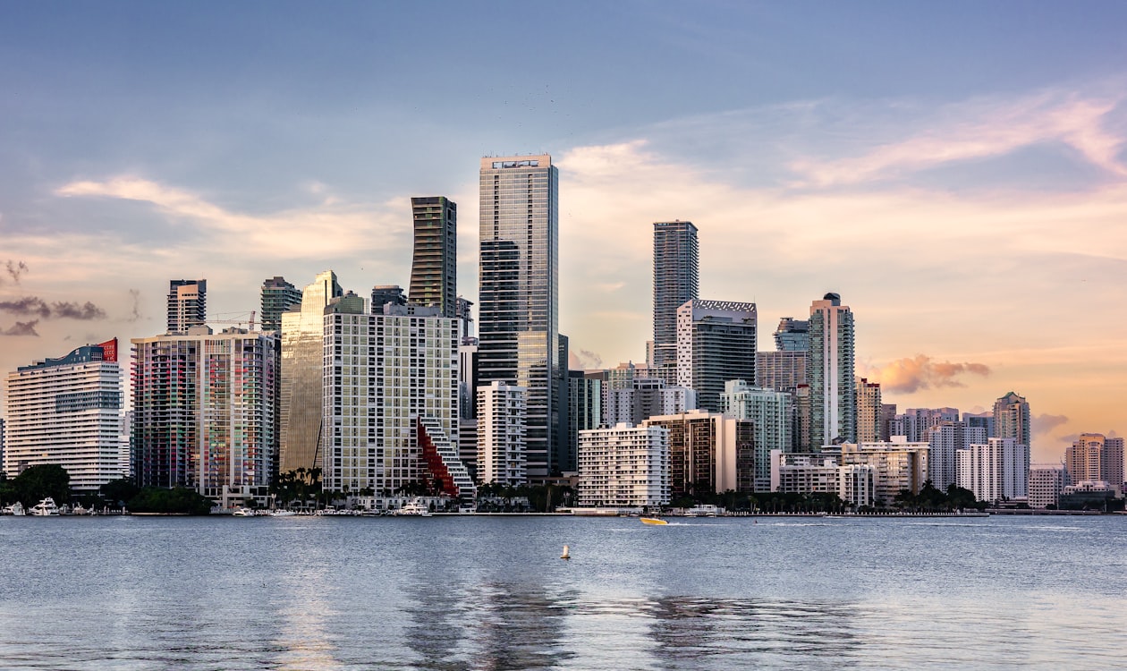 Downtown Miami and Brickell skyline over Biscayne Bay, where 14 ROC broke ground 50% sold in 2026