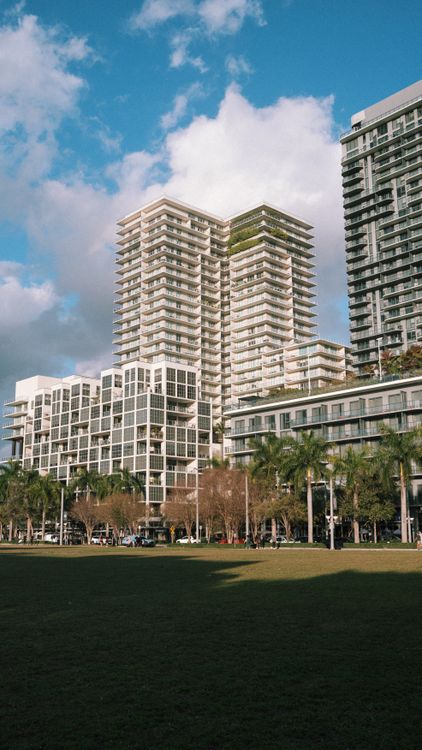 Miami luxury residential towers over green space, illustrating the 14.2% luxury price gain Redfin reported for 2026