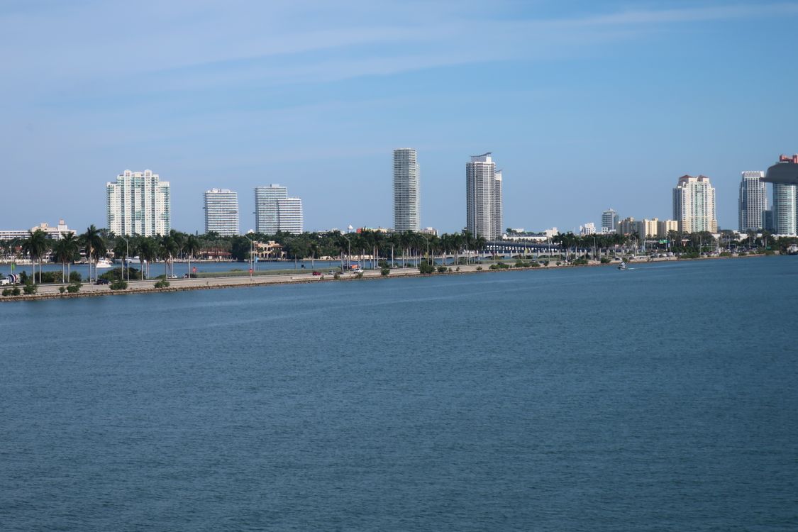 Miami residential condo towers rising across Biscayne Bay under Florida's Live Local Act zoning and tax incentives in 2026