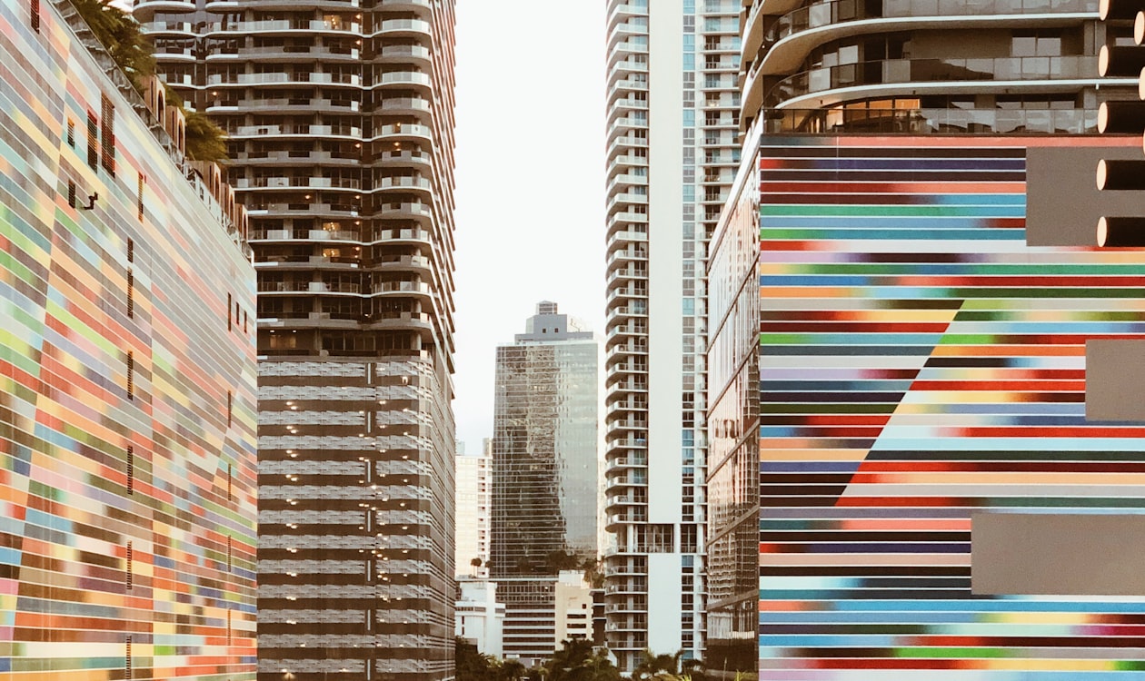 Brickell residential towers in Miami viewed from street level, condo market supply and demand