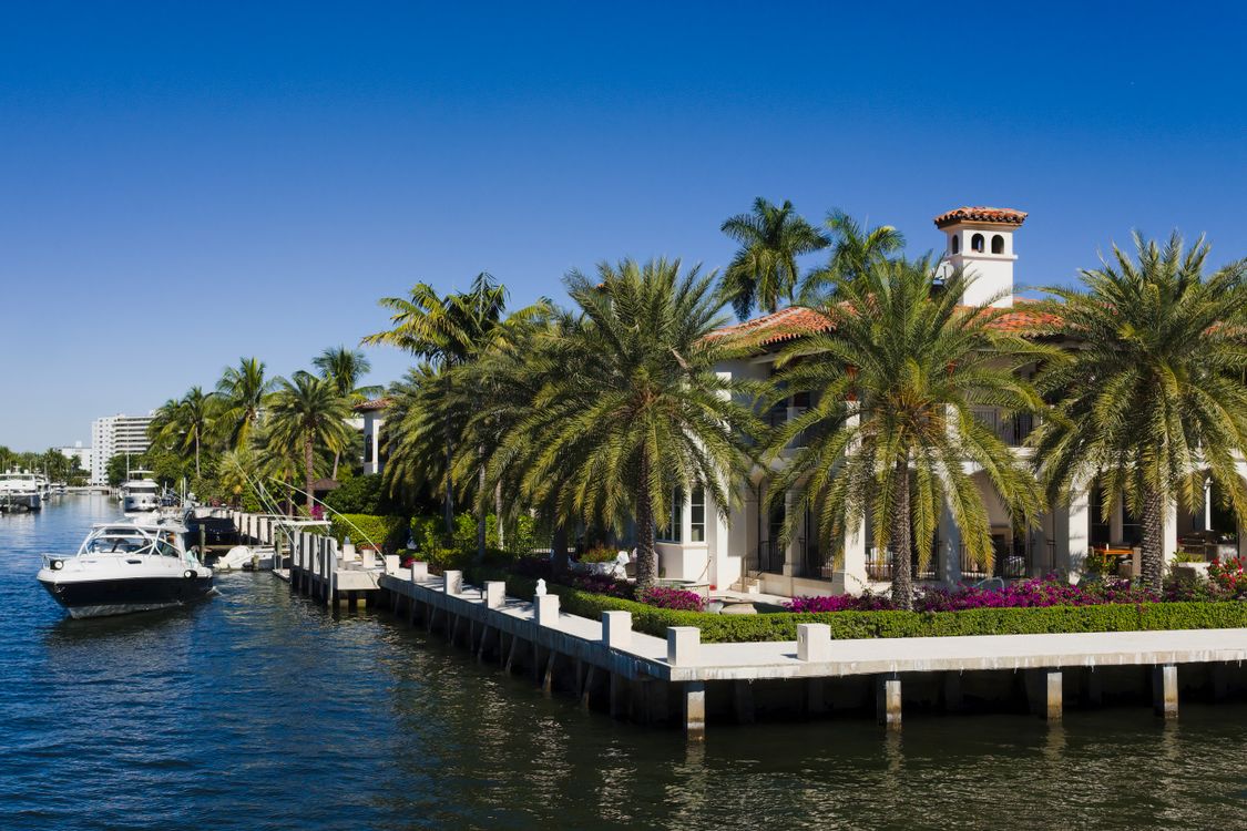 Canal-front homes with private docks and boats in Fort Lauderdale, Broward County, Florida