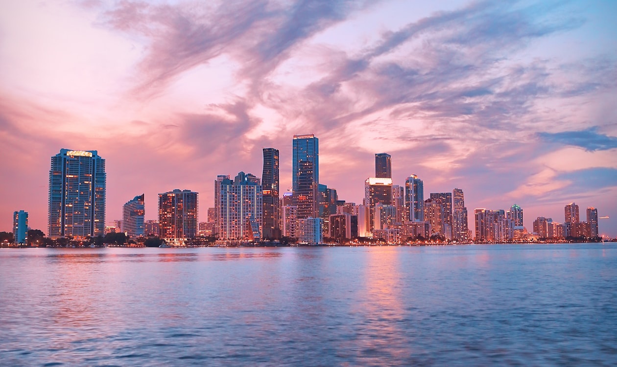 Brickell waterfront skyline at dusk in Miami, where ultra-luxury towers are reaching full height