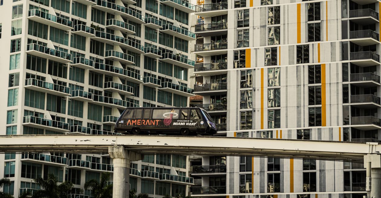 Metromover passing high-rise condominium towers in Brickell, the density model Golden Beach zoning rules out
