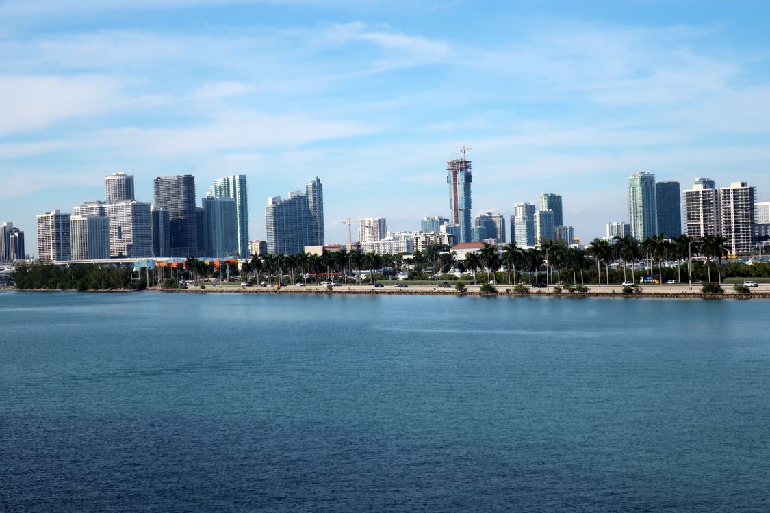 Miami bayfront skyline with residential towers under construction, the vertical supply Golden Beach does not allow