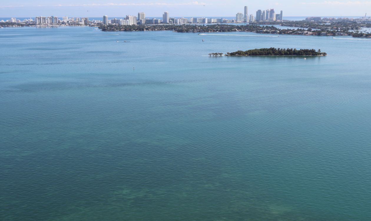 Private island in Biscayne Bay with the Miami Beach skyline in the distance
