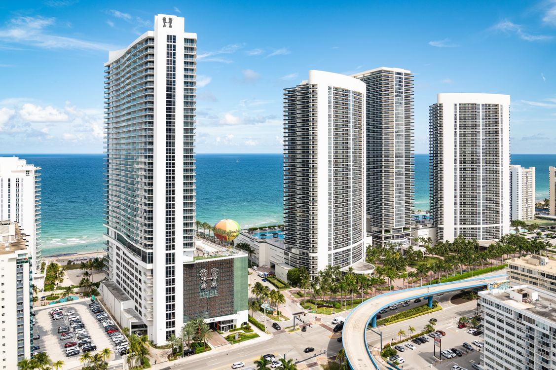 Oceanfront condominium towers lined along the South Florida coast north of Miami