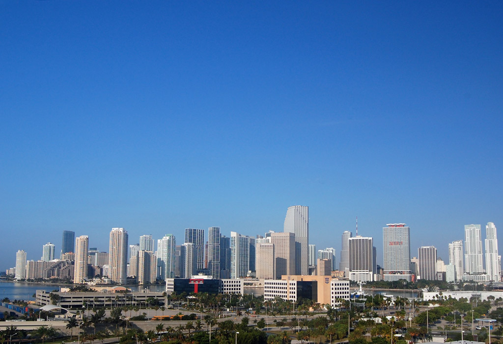 Downtown Miami skyline of high-rise towers seen across the water from the Miami Beach barrier island