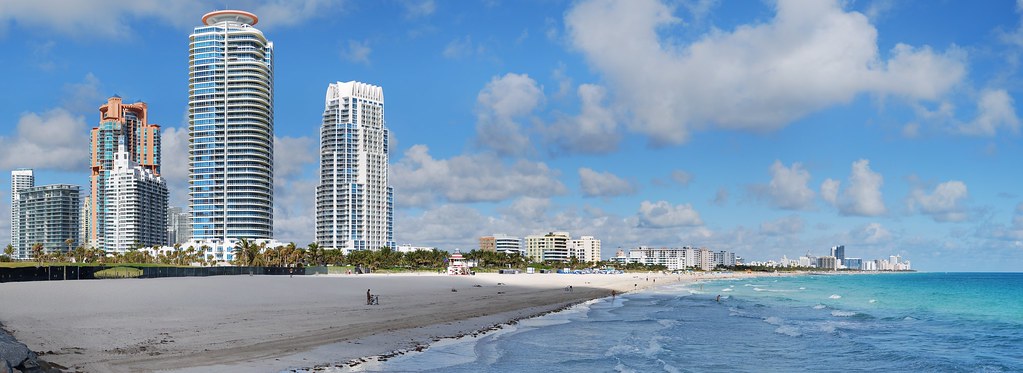 South Beach skyline with the South Pointe condo towers, white sand beach, and Atlantic Ocean in Miami Beach, Florida