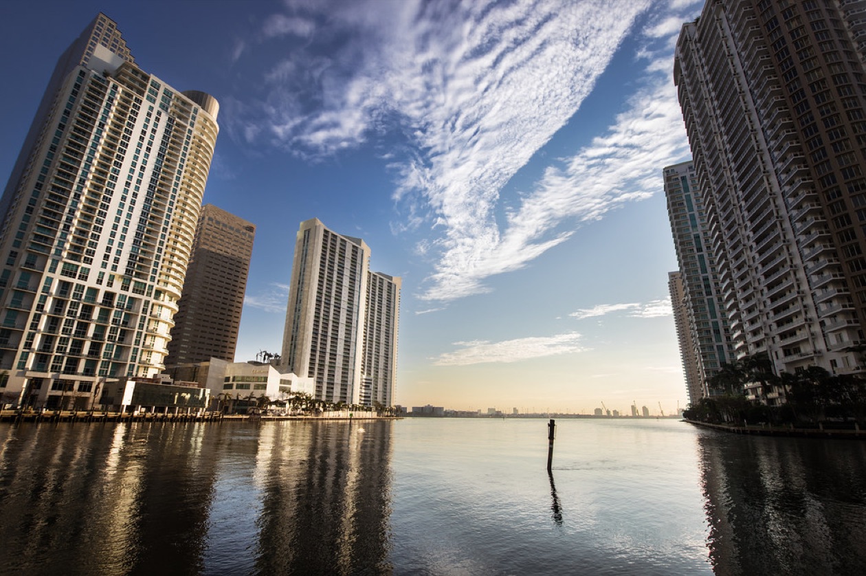 Brickell Key condo towers at sunrise on Biscayne Bay