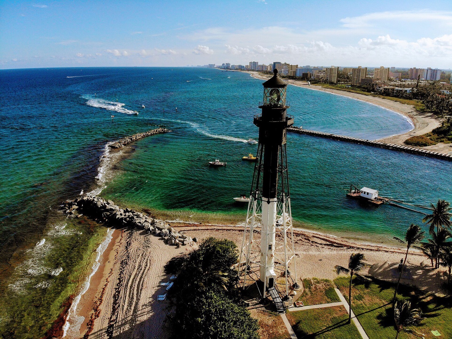 Aerial view of the Hillsboro Inlet Lighthouse and the Hillsboro Beach barrier island in Broward County, Florida