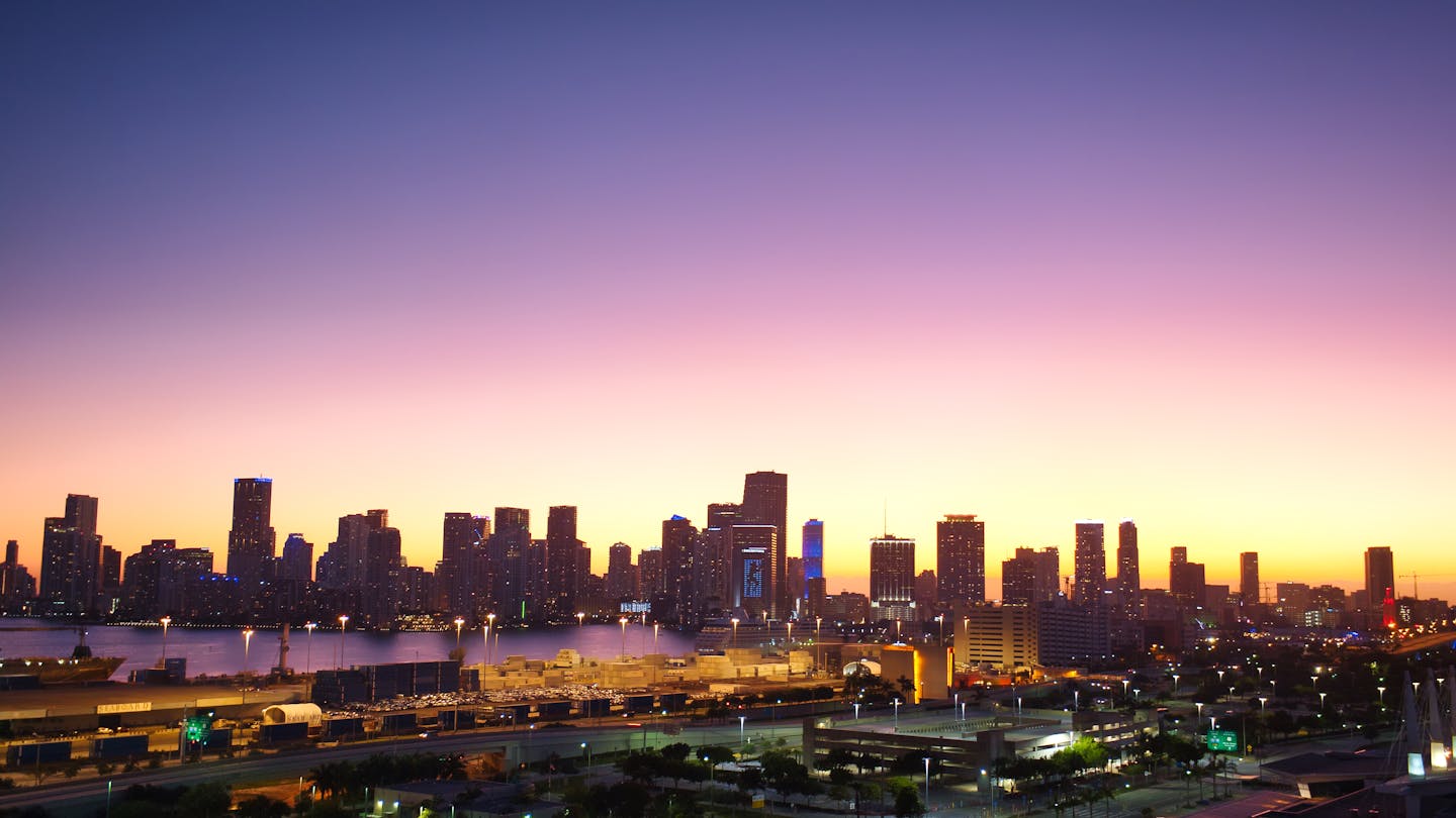 Miami downtown skyline at dusk reflecting the scale of foreign real estate investment