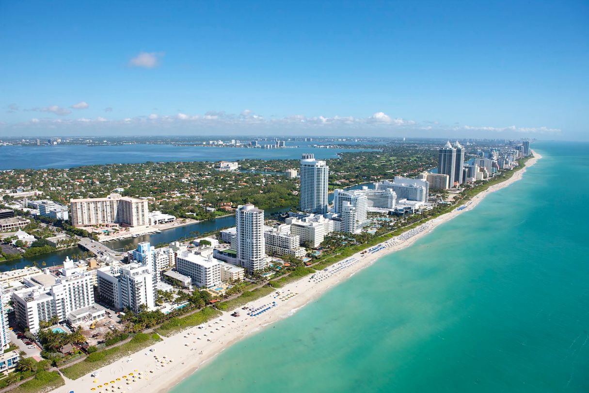 Aerial view of the Mid-Beach oceanfront condominium corridor in Miami Beach