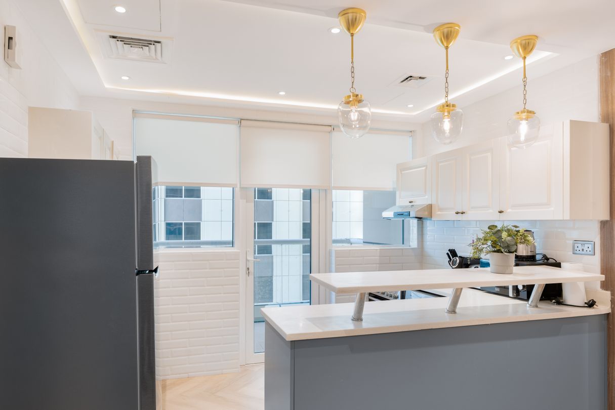 Modern Miami luxury condo kitchen interior with city views, the finished product preconstruction deposits pay for