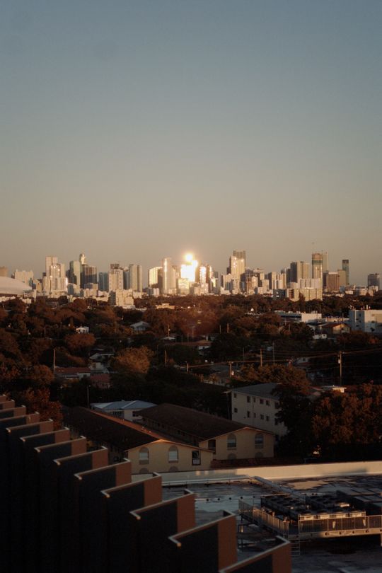 Downtown Miami luxury condo skyline at golden hour seen from above