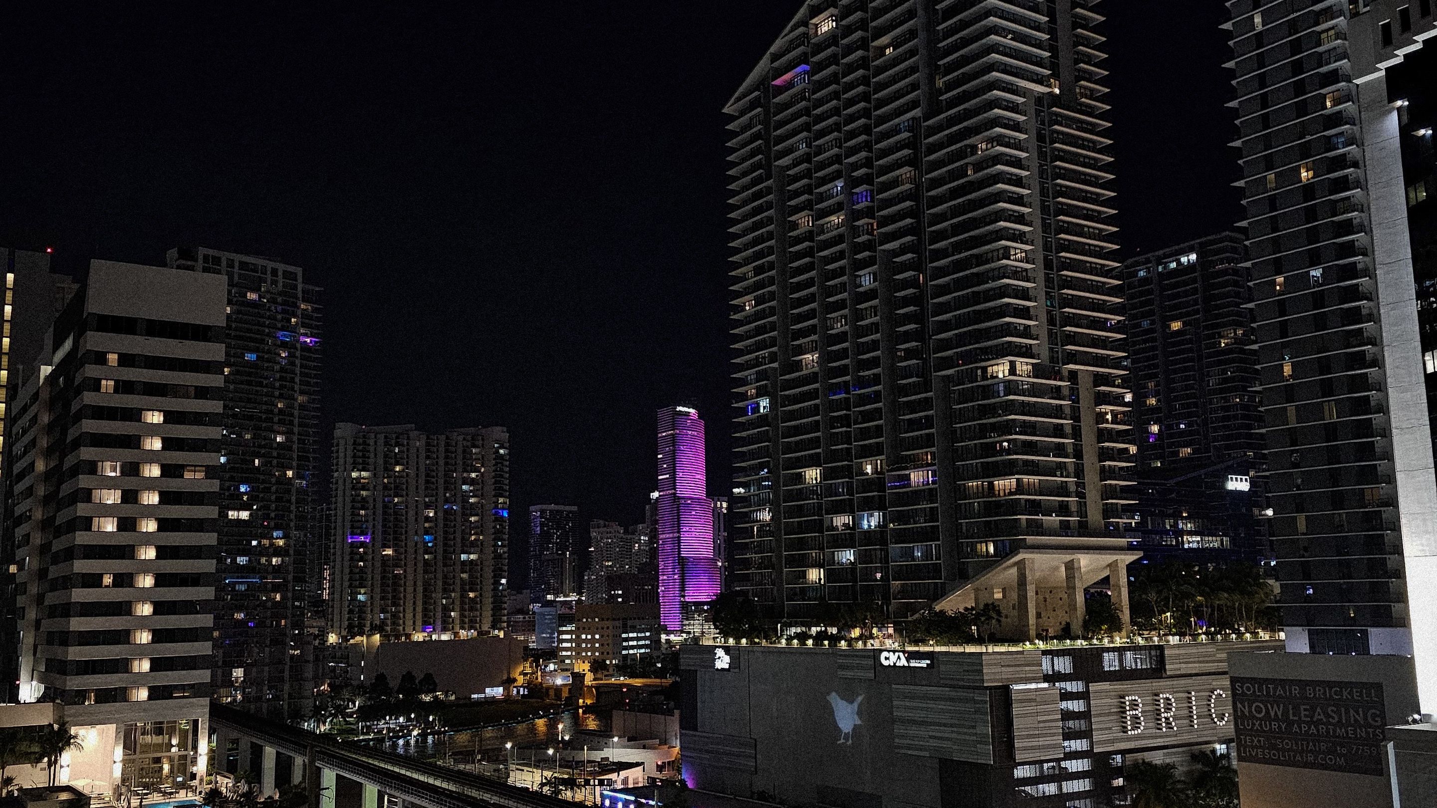 Brickell condo towers lit at night, where 73 percent of South Florida foreign-buyer volume concentrates