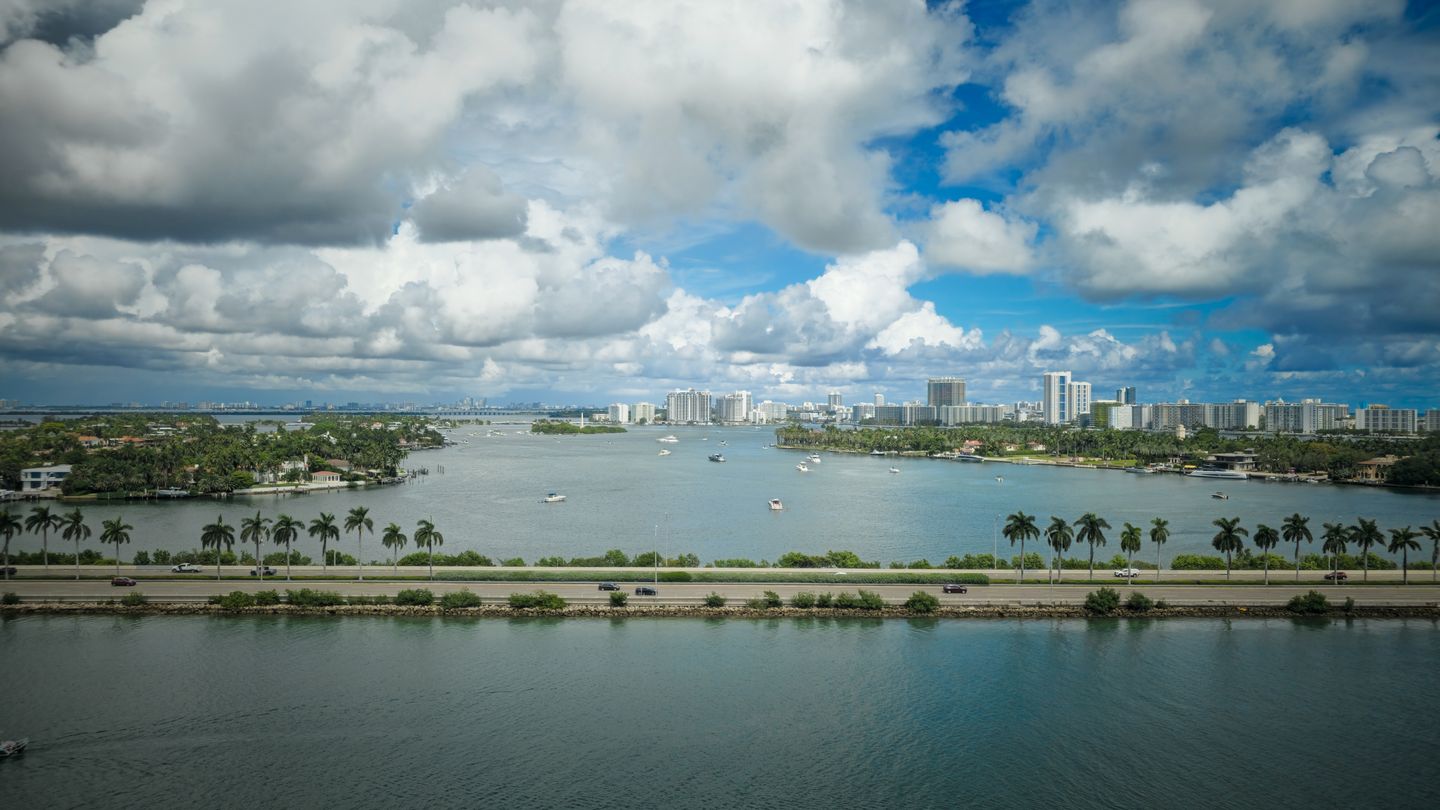Oceanfront Miami condo towers lined along the Atlantic shoreline in North Miami-Dade