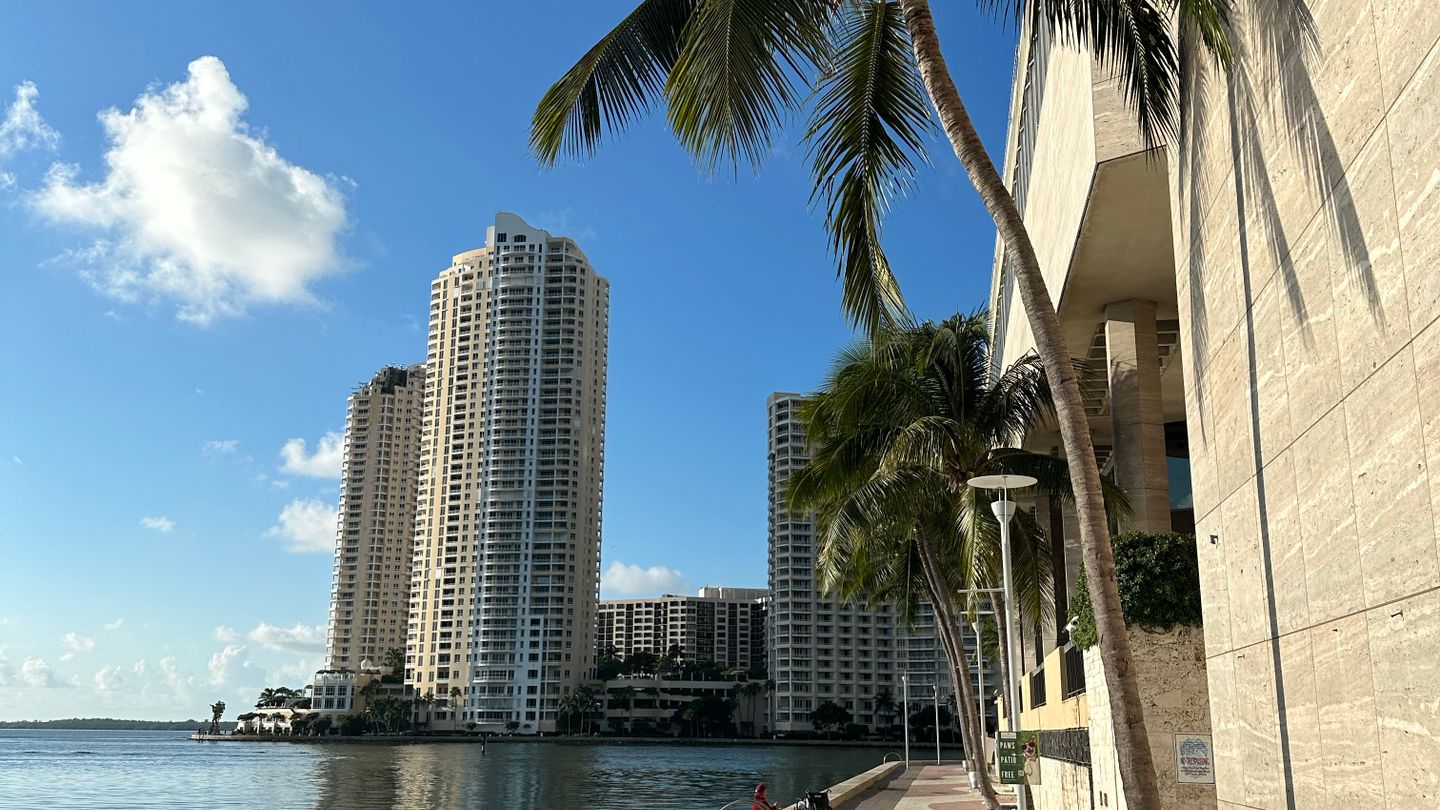 Brickell Key waterfront promenade with luxury condo towers, a magnet for safe-haven capital