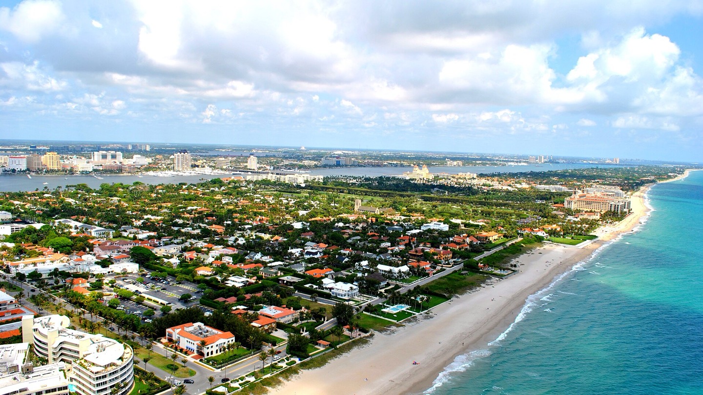 Aerial view of the Town of Palm Beach oceanfront with The Breakers and the Lake Worth Lagoon in Palm Beach County, Florida