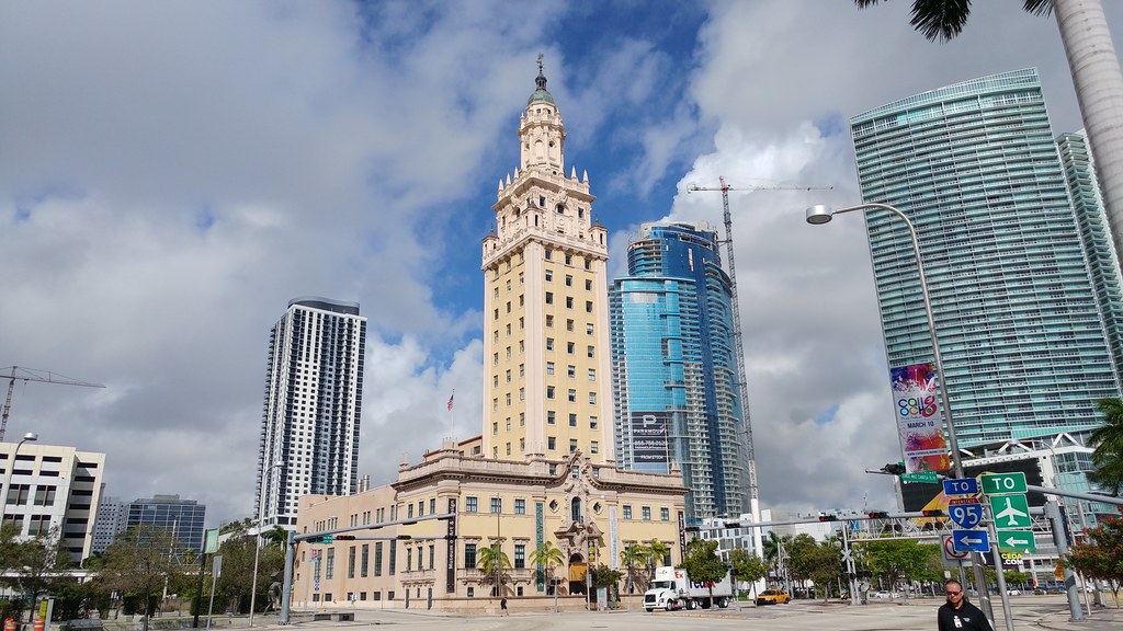Downtown Miami skyline with the Freedom Tower and a condominium tower under construction behind a crane