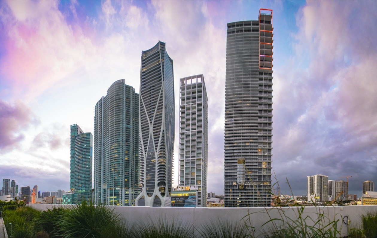 Downtown Miami luxury condo towers at dusk