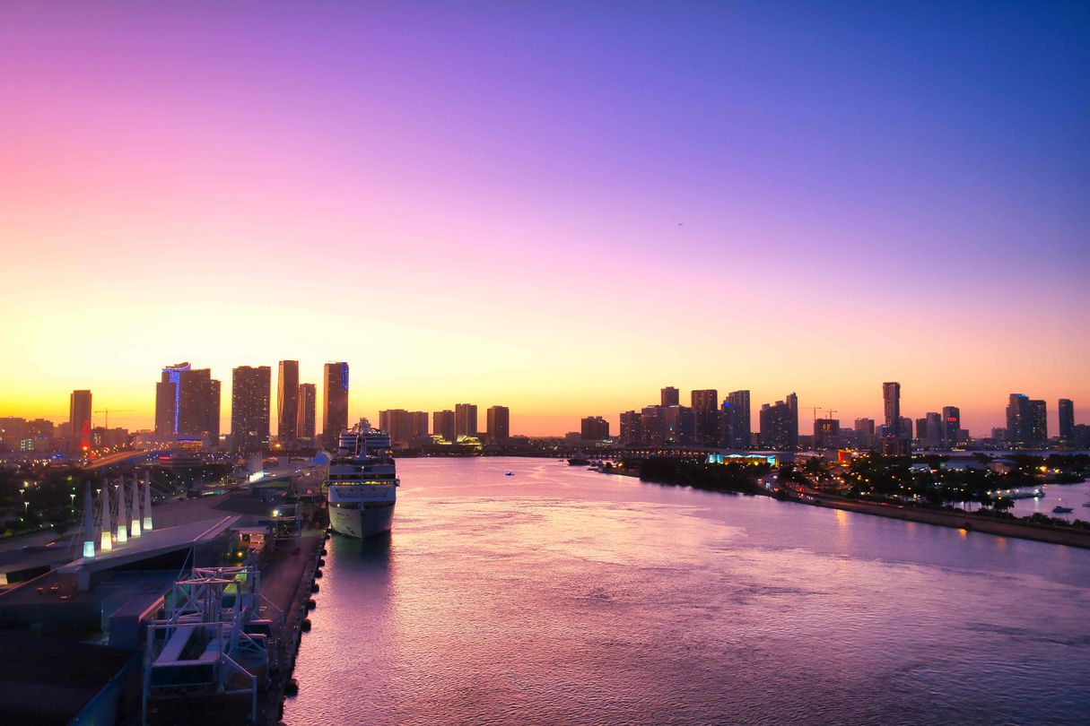 Aerial view of a Miami condo development corridor at sunset, pre-construction buying process