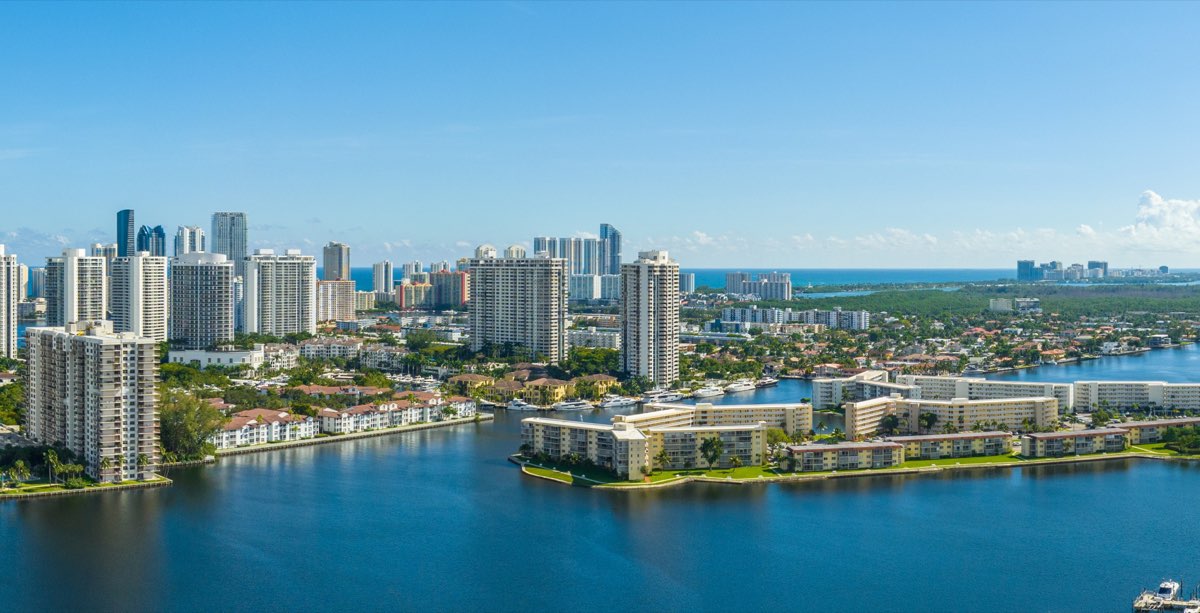 Aerial view of the Aventura, Florida skyline with luxury high-rise condominium towers along the Intracoastal Waterway